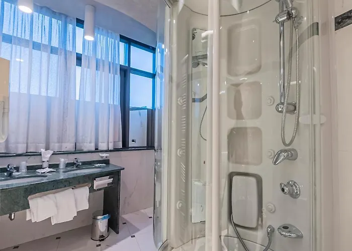 Отель Dado International