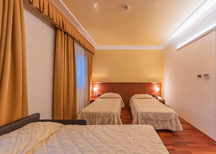 Отель Dado International